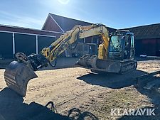 Grävmaskin New Holland E75CSR med redskap